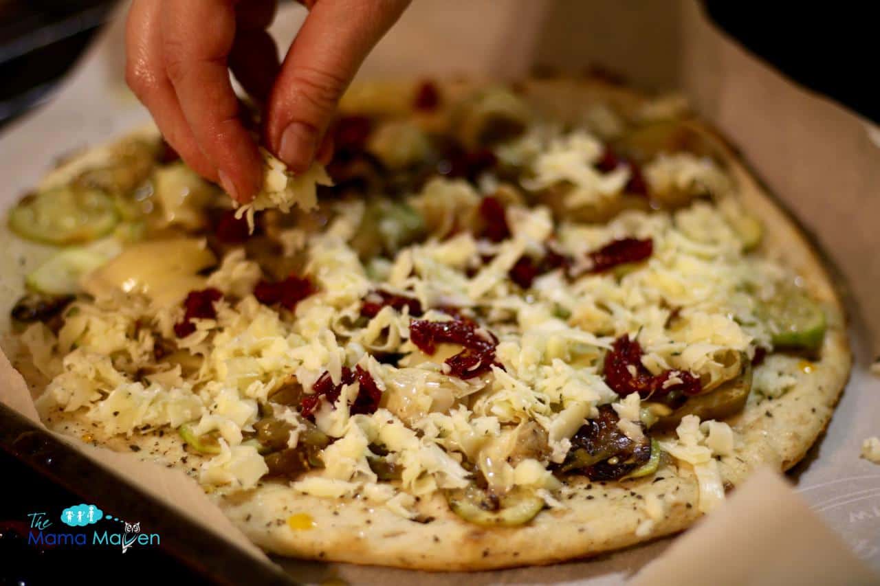 Zucchini Artichoke Flatbread with Tomato Olive Jack Cheese